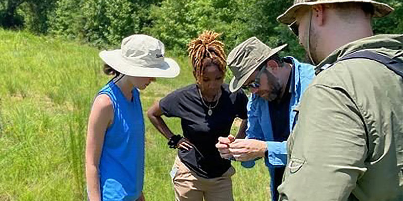 Dr. Nathan Harness of Francis Marion University with students.