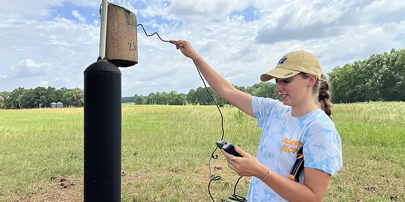 Morgan checking nest box with an endoscope. Morgan checking nest box with an endoscope.