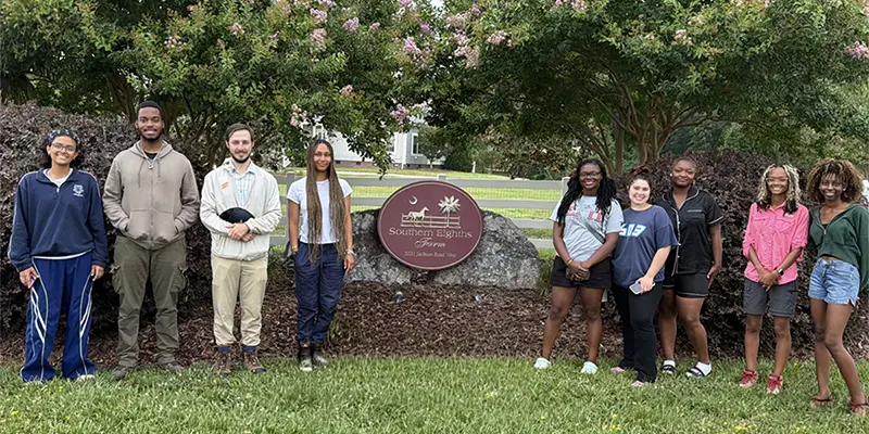 2026 students at the entrance to the Preserve